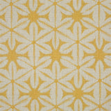 Printed linen in a shibori tie-dye pattern in yellow. 