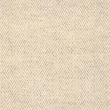 Broadloom carpet with a subtle herringbone pattern in taupe and ivory