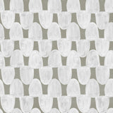 Detail of wallpaper in an abstract scalloped print in white on an olive field.