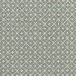 Broadloom carpet with dotted lattice in cream on an aqua blue field. 