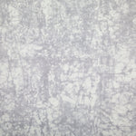 Detail of velvet fabric in an organic crumpled texture in light gray on a cream field.