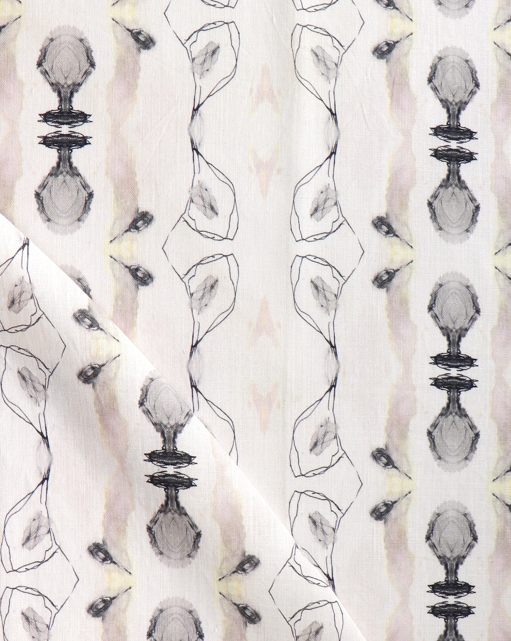 Detail of draped fabric yardage in a watercolor ikat stripe print in shades of cream, pink and gray on a white field.
