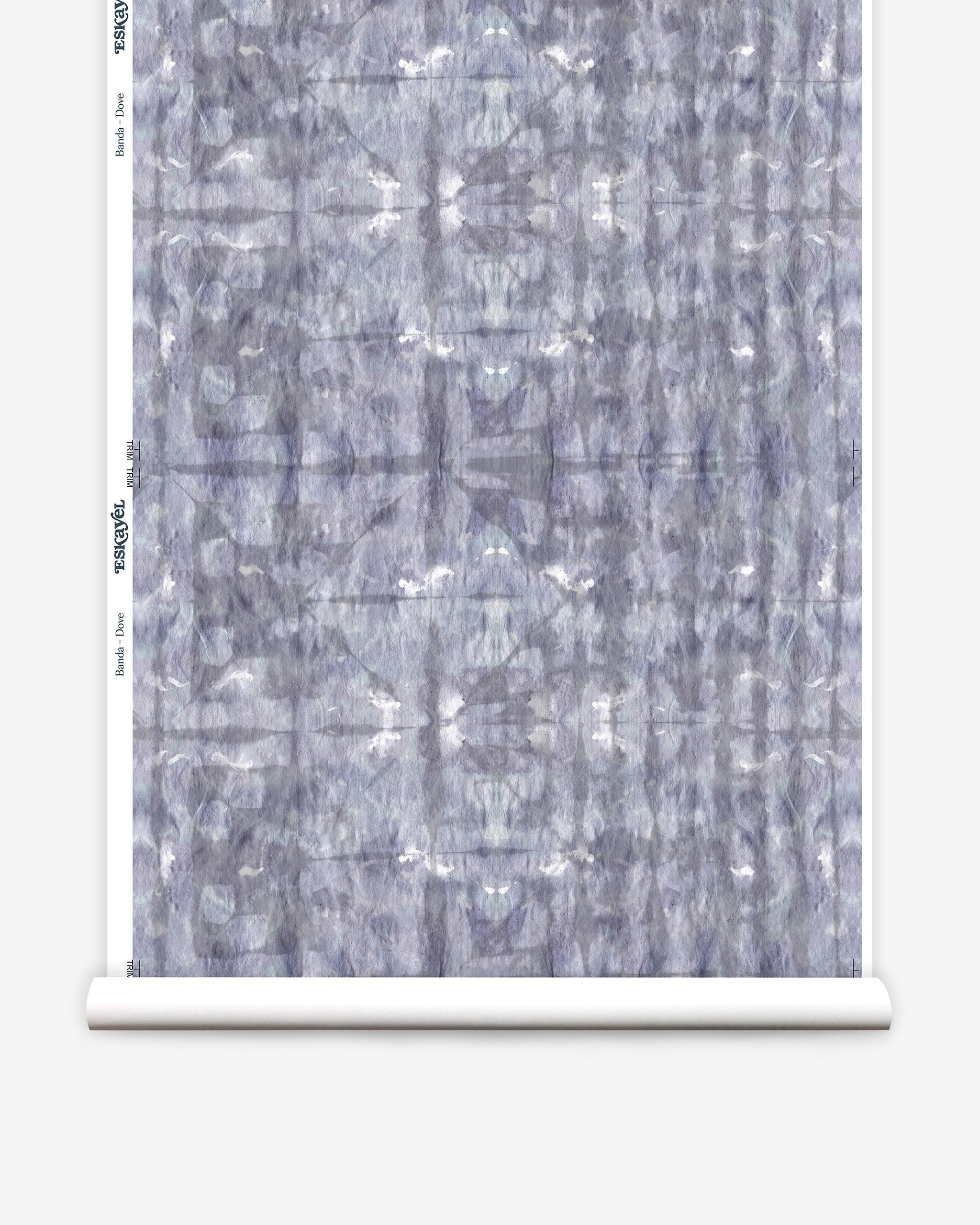 Partially unrolled wallpaper yardage in a watercolor dyed grid print in mottled purple.