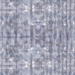 Detail of wallpaper in a watercolor dyed grid print in mottled shades of purple
