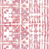 Detail of wallpaper in a watercolor dyed grid print in mottled white, pink and red.