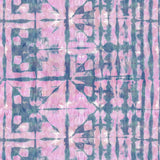 Detail of wallpaper in a watercolor dyed grid print in mottled pink and navy.