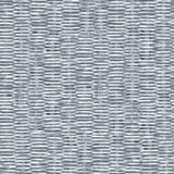 Detail of wallpaper in a textural checked print in navy on a white field.