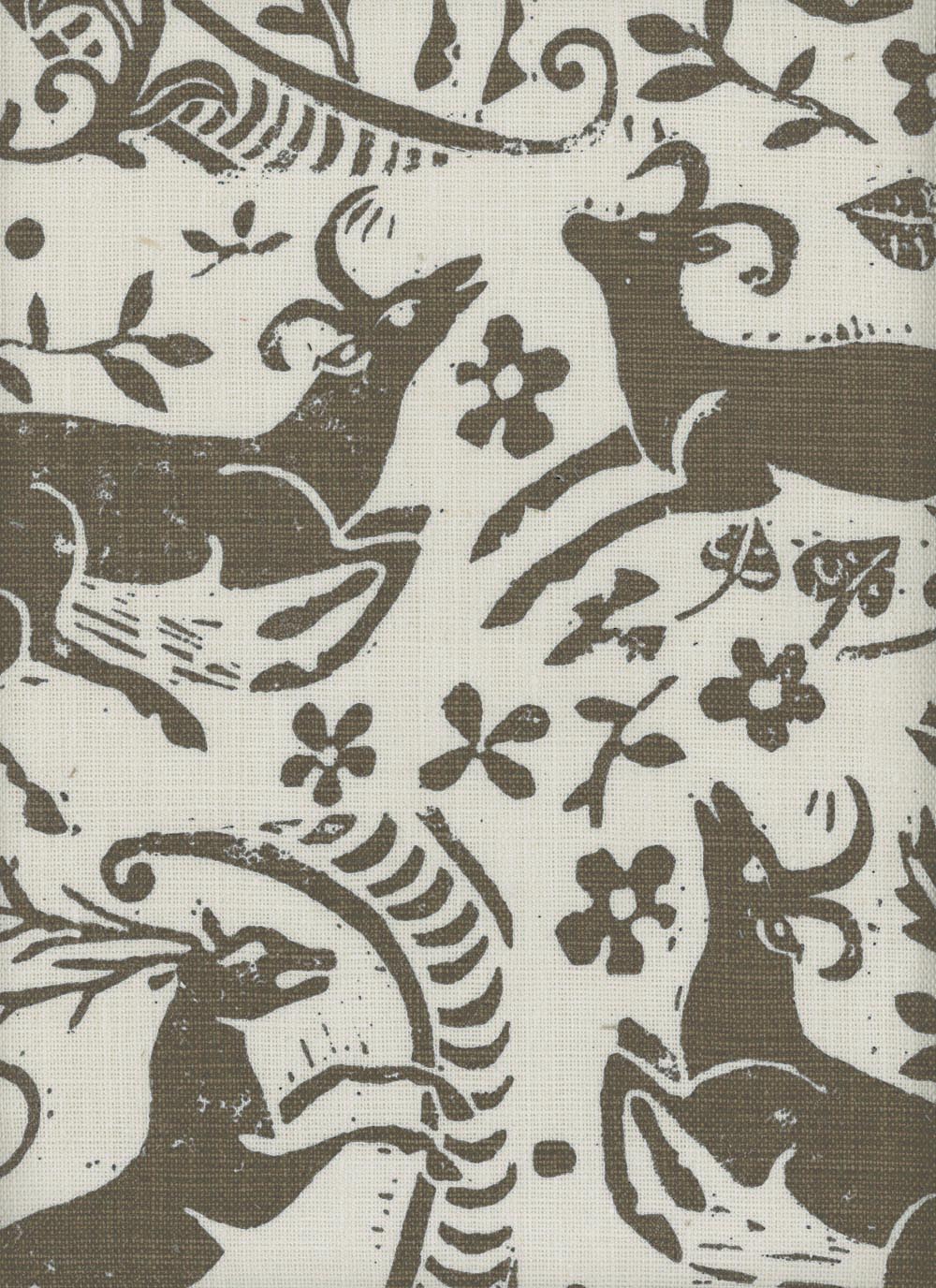 Close-up of fabric in a deer, leaf and flower print in taupe on a cream field.