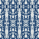 Detail of wallpaper in a painterly ikat print in blue and white.