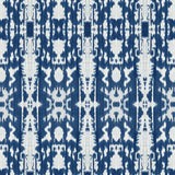 Detail of wallpaper in a painterly ikat print in blue and white.