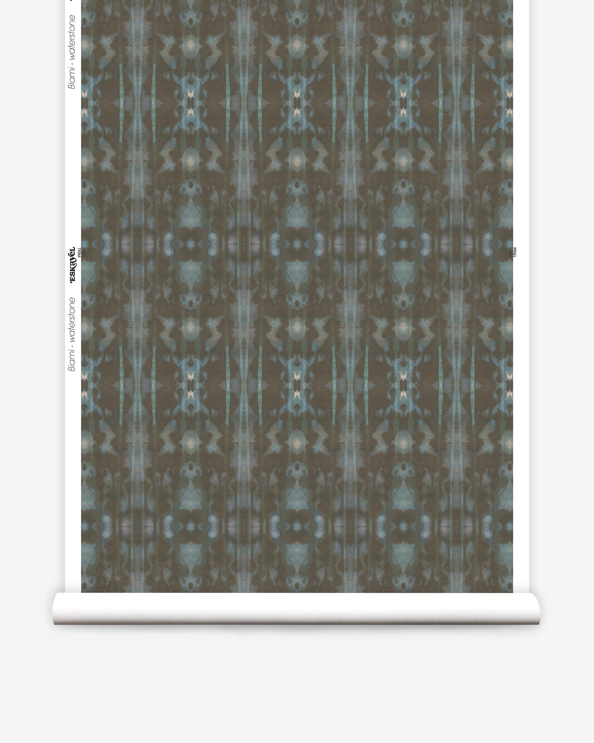 Partially unrolled wallpaper yardage in a painterly ikat print in turquoise and brown.