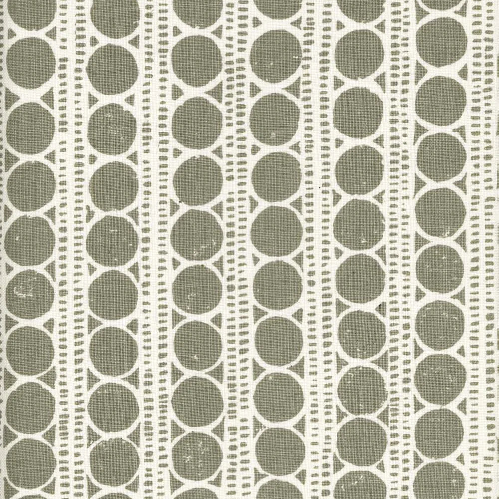 Patterned fabric with grey circles on a white background