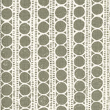 Patterned fabric with grey circles on a white background