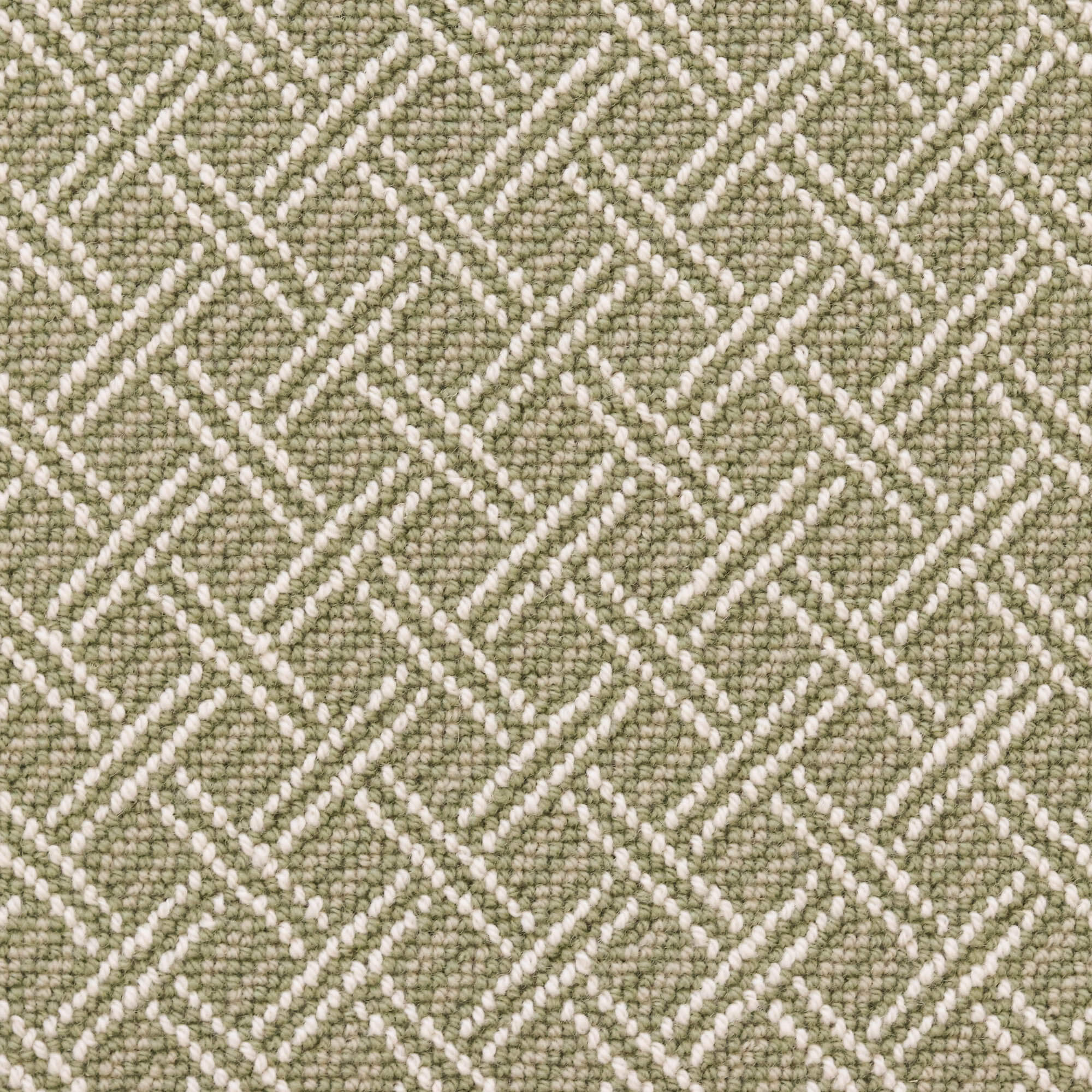 Broadloom carpet with ivory double line lattice on a light green field. 