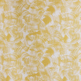 Detail of fabric in an absract paint swatch print in yellow on a white field.