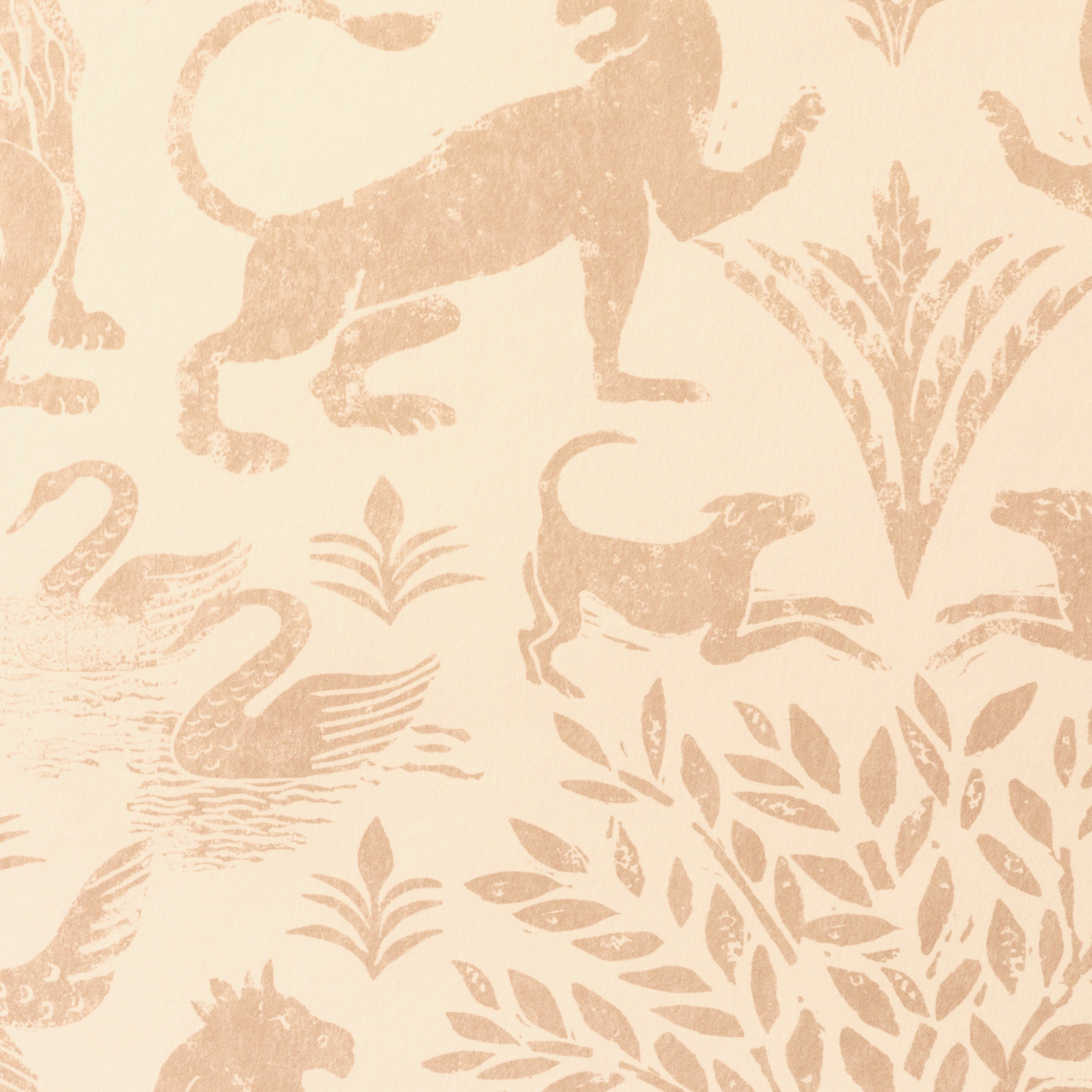 Detail of wallpaper in a lion and plant print in light pink on a white field.