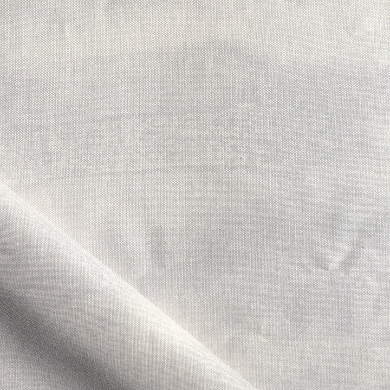 Close-up of white fabric with subtle texture