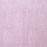 Detail of fabric in a painterly dotted print in purple on a white field.