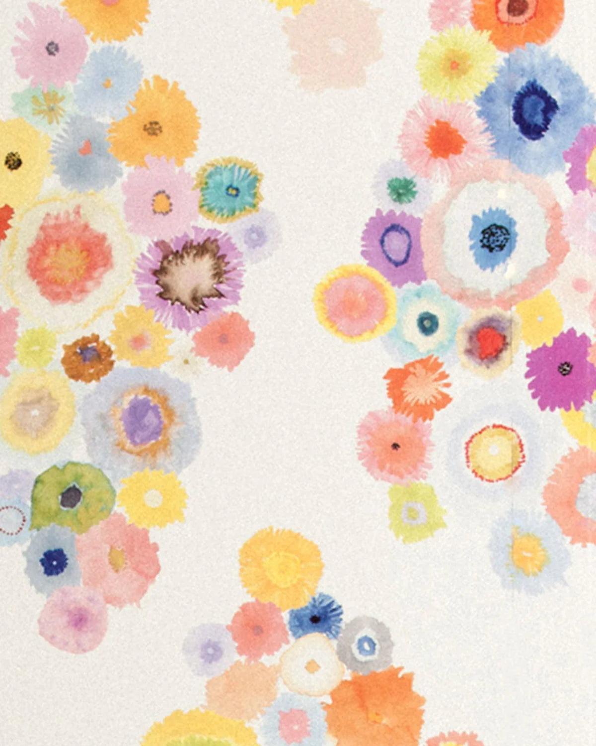 Detail of wallpaper in a painterly floral print in multicolor pastels on a white field.