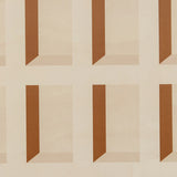 Detail of wallpaper in a dimensional grid print in shades of cream and rust.