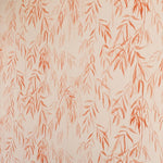 Detail of wallpaper in a painterly willow leaf print in coral on a cream field.