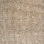 Handknotted rug in a textural loop in ivory. 