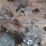 Draped fabric in an underwater sealife scene in shades of mauve, grey and turquoise. 