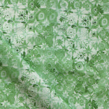 Patterned watercolor lace fabric in green