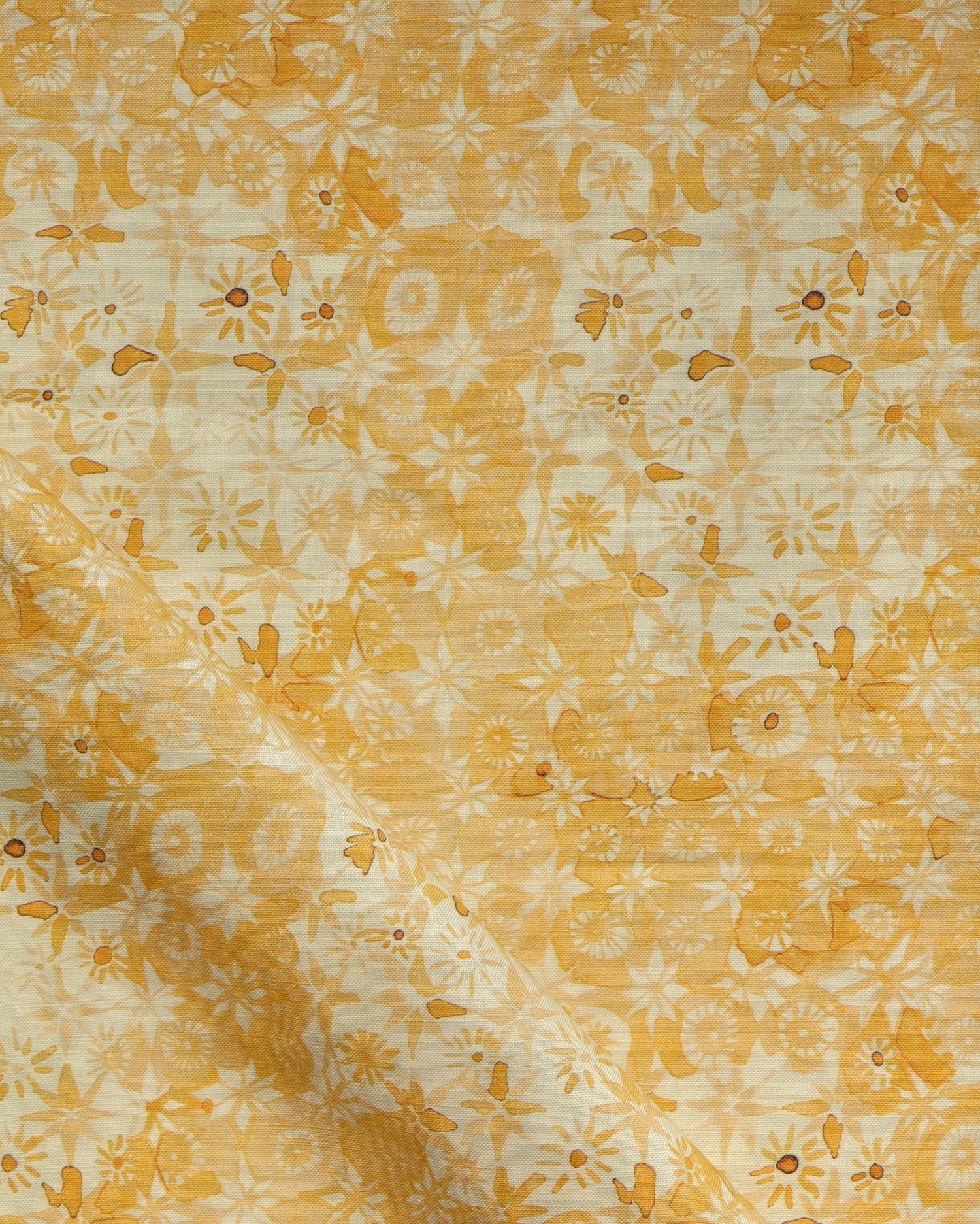Patterned watercolor lace fabric in yellow