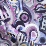 Draped fabric in abstract brushstroke design in shades of purple and black accents. 