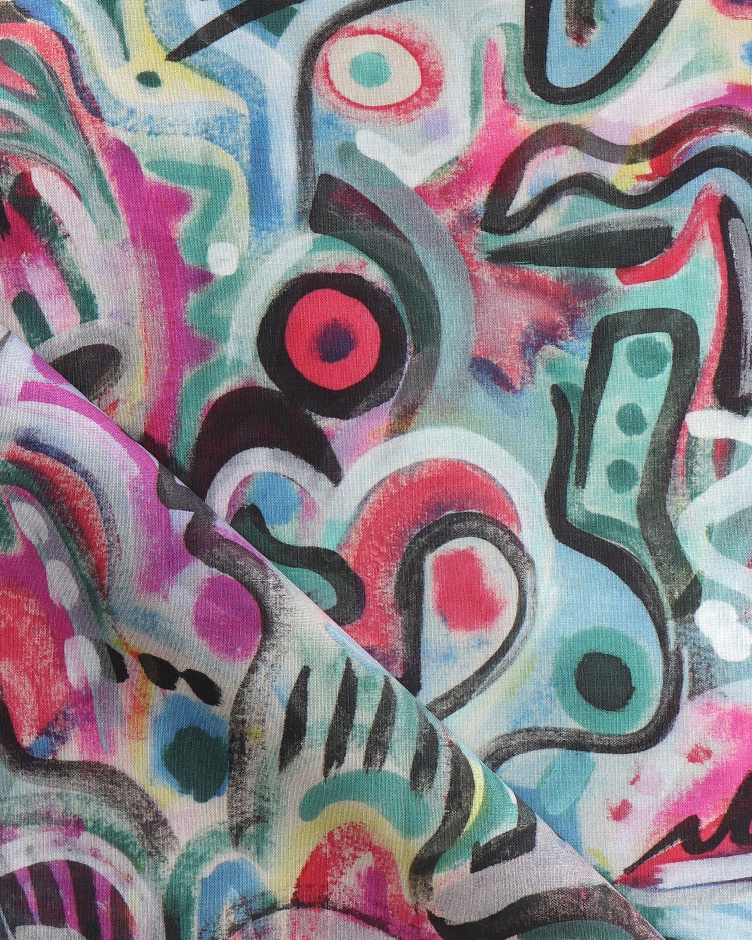 Draped fabric in abstract brushstroke design in shades of pink, turquoise, green, blue, yellow and black accents. 