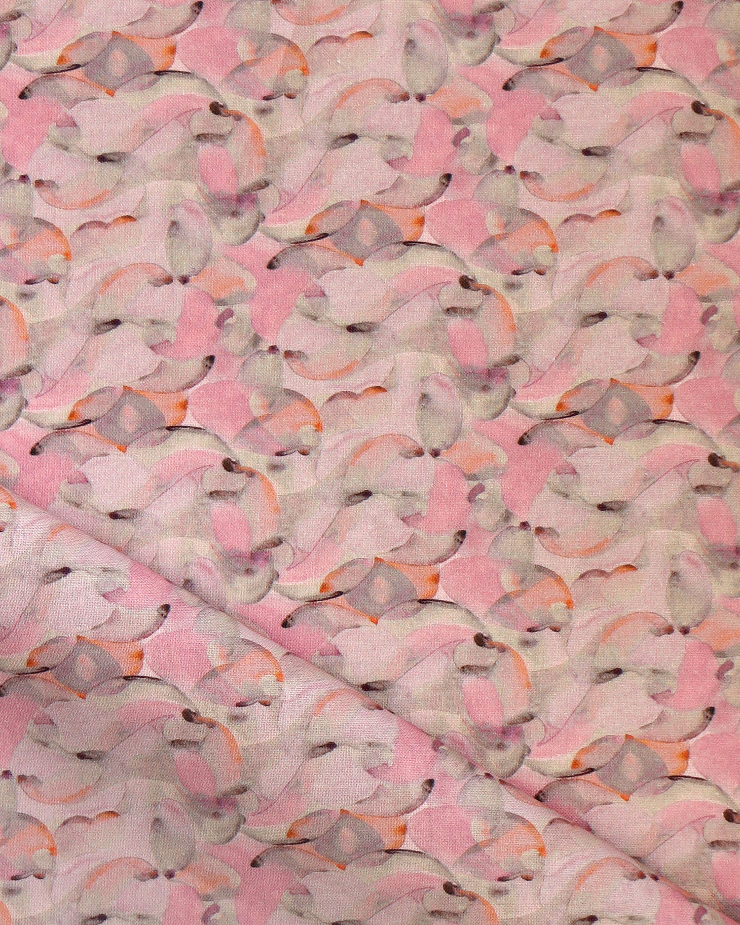 Draped fabric in an undulating abstract watercolor motif in pink, orange and grey. 