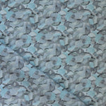 Draped fabric in an undulating abstract watercolor motif in shades of steel blue and charcoal. 