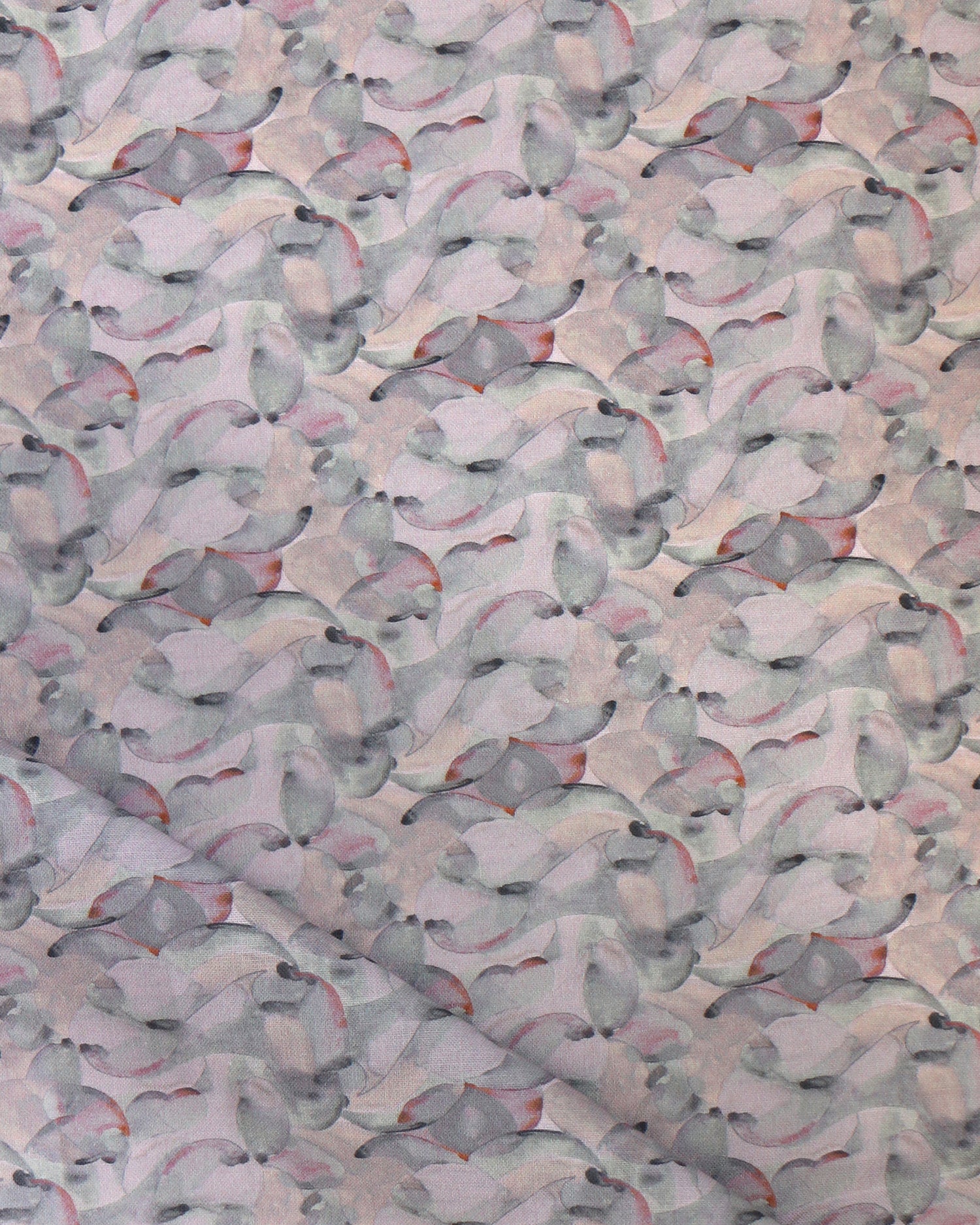 Draped fabric in an undulating abstract watercolor motif in light purple, blush, rust and charcoal.