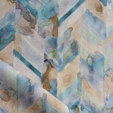 Detail of draped fabric in a painterly herringbone print in shades of blue, green and brown.
