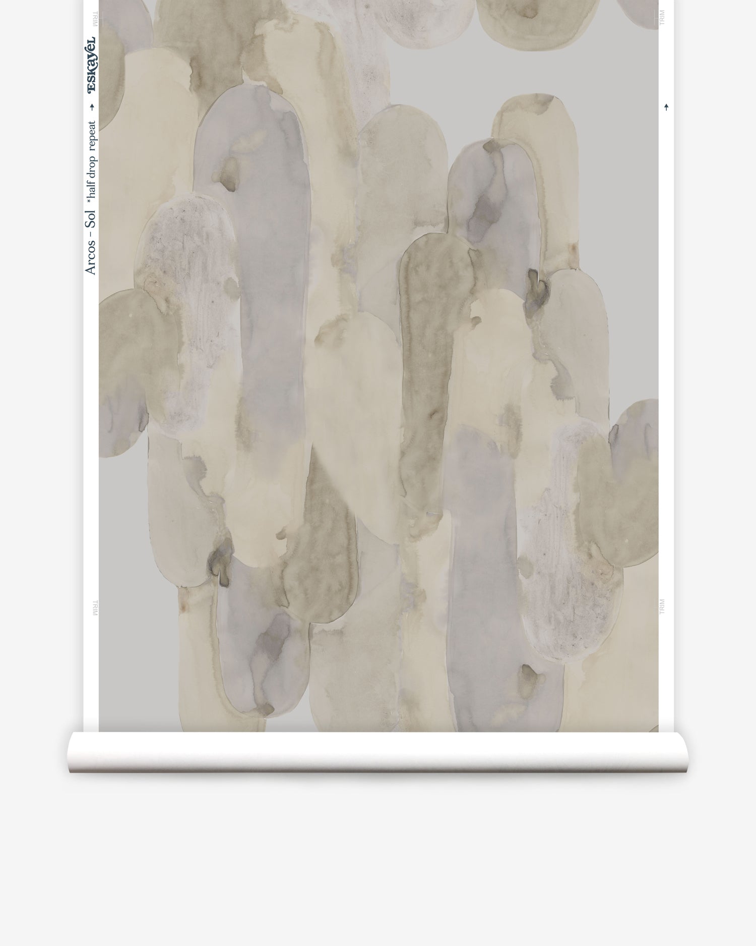 Wallpaper roll in watercolor elongated pill pattern in tan, taupe and grey on a white field.