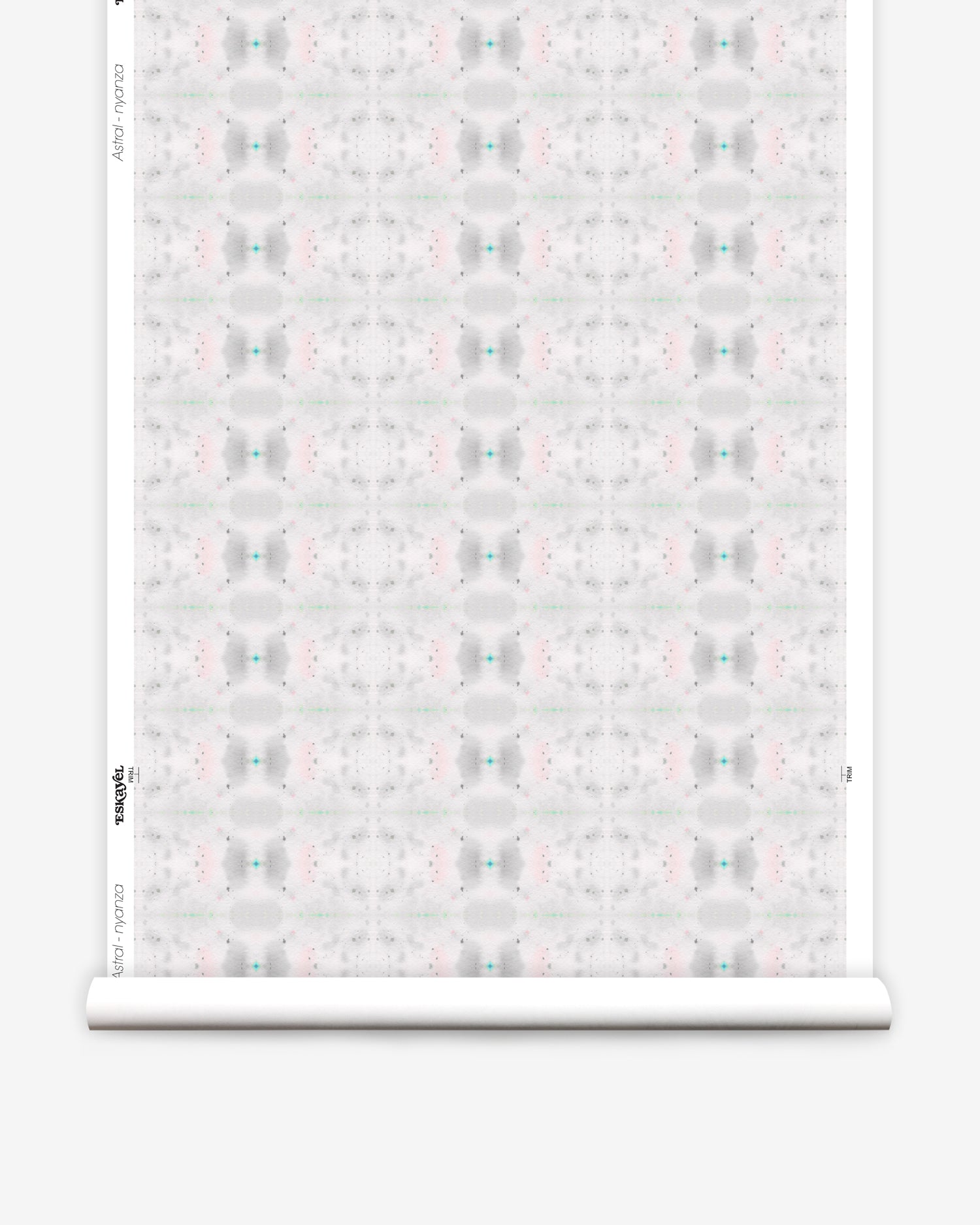 Wallpaper roll in a repeating ink blot print in shades of gray with turquoise and pink accents.