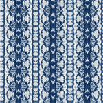 Detail of wallpaper in a watercolor ikat stripe print in shades of white and blue on a gray field.