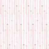 Detail of wallpaper in a painterly stripe print in light pink on a white field.