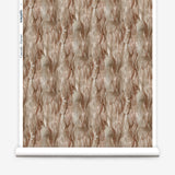 Draped fabric in a layered squiggle watercolor pattern in shades of brown