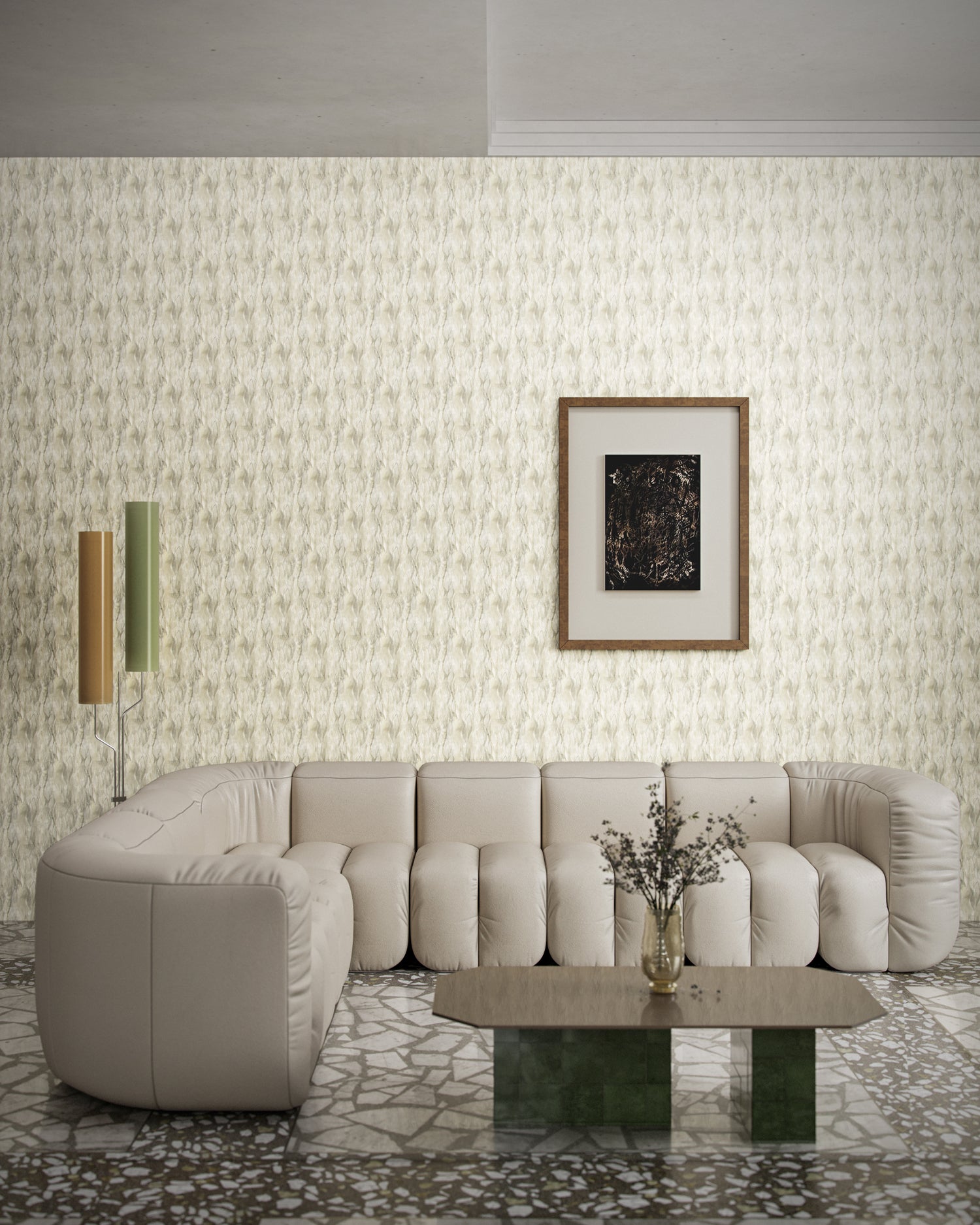 Modernist living room with beige leather couch, steel table and framed art against textural taupe watercolor wallpaper. 