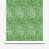 Green floral patterned paper with a white border
