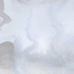 Mural wallpaper detail in an abstract textural watercolor design in pale grey blue. 