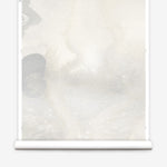 Mural wallpaper roll in an abstract textural watercolor design in in warm beige.