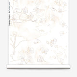 Wallpaper roll in a watercolor branch and floral pattern in beige on a white field.