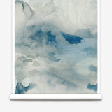 Wallpaper roll of an ethereal watercolor mural in shades teal, blue and soft grey. 