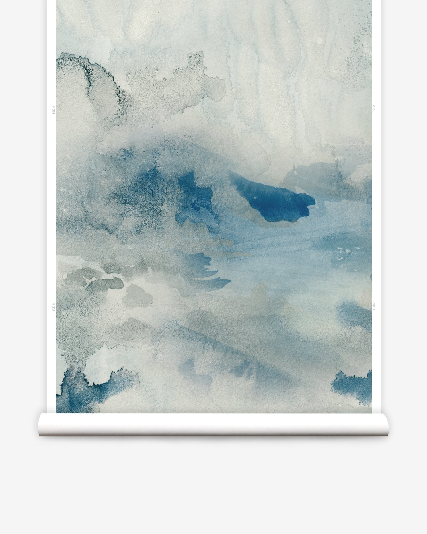 Wallpaper roll of an ethereal watercolor mural in shades teal, blue and soft grey. 