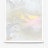 Wallpaper roll of an ethereal watercolor mural in shades  blush pink, yellow, aqua and grey. 