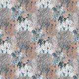 Detail of wallpaper in a painterly tree print in light turquoise and gray on a coral field.