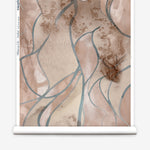 Wallpaper roll in abstract floral bushstroke design in warm brown with teal. 